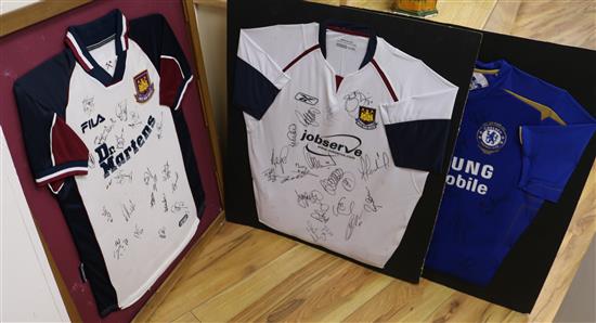 Two West Ham player signed shirts from 2000s and a similar Chelsea shirt (all mounted)